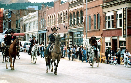 cowboys on horses in downtown cripple creek