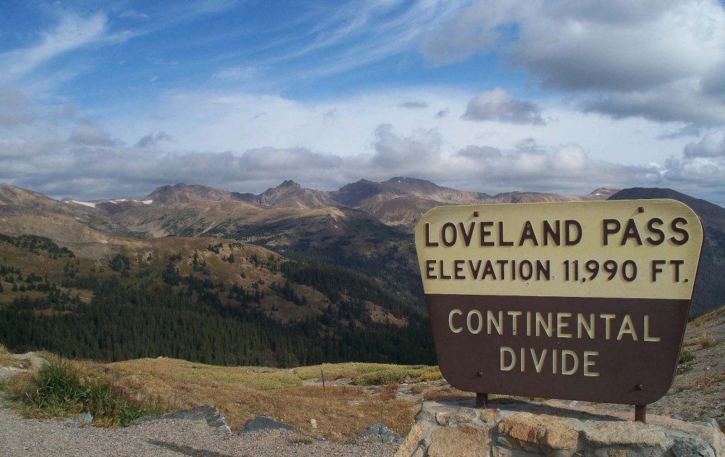 loveland pass continential divide sign with mountains in distance