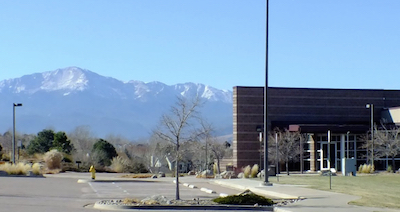 mountains in background with building on right